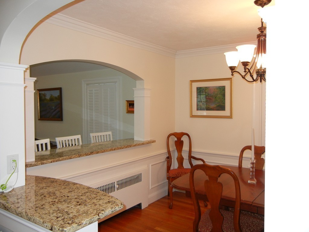 12 Calvert Road Walpole, MA 02032 - Photo 8 of 30 a bathroom with a tub sink and mirror