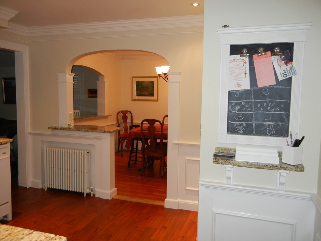 12 Calvert Road Walpole, MA 02032 - Photo 9 of 30 a view of front door with entryway and dining room