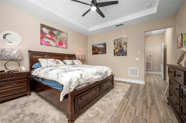 a bathroom with a sink vanity and a mirror