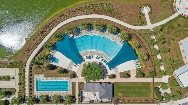 a view of swimming pool with a yard
