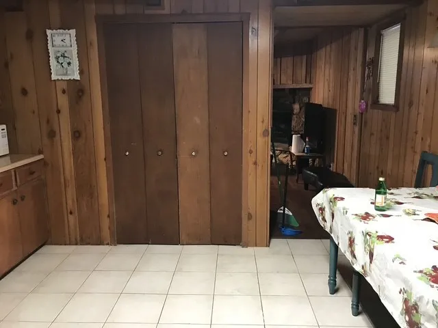 a bathroom with a sink vanity and mirror