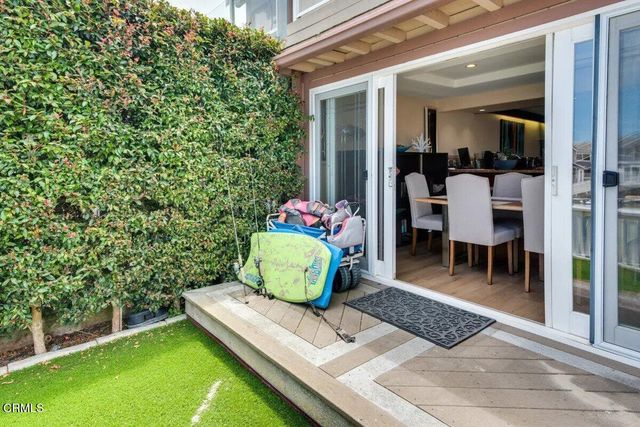 a view of a lobby with chair and tables