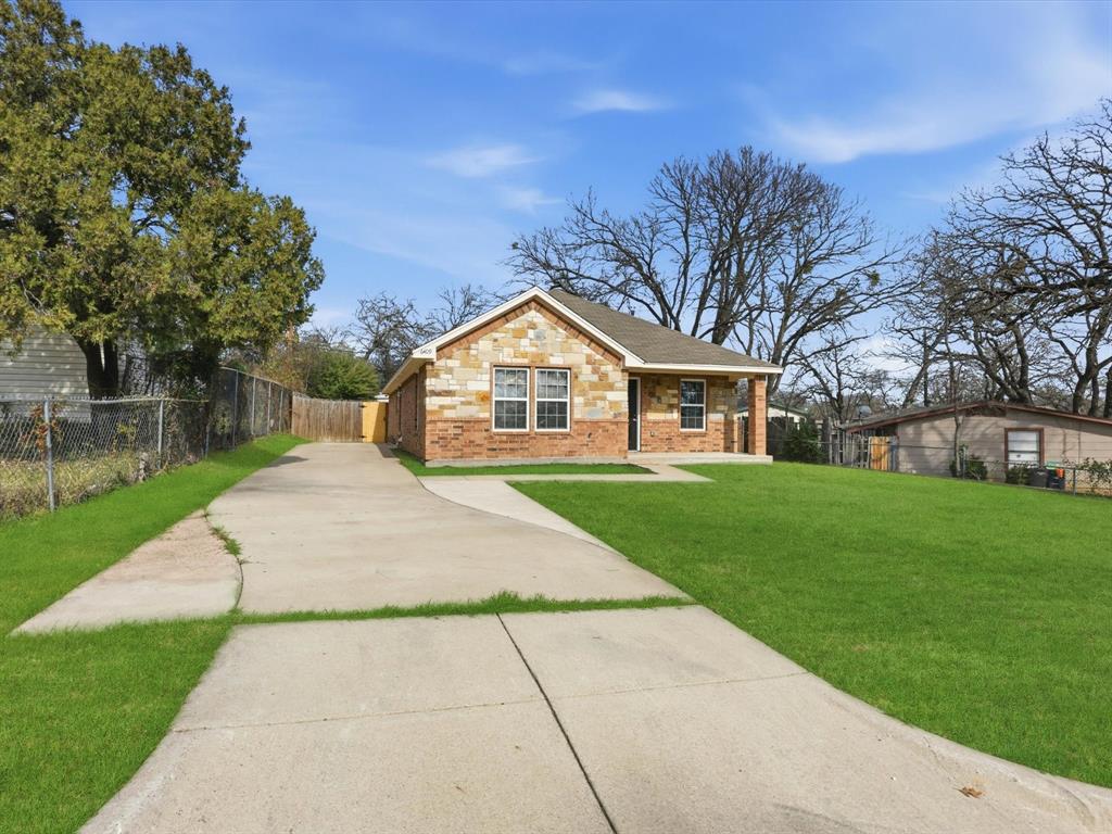 6409 Ramey Avenue Fort Worth, TX 76112 - Photo 3 of 25 a view of outdoor space yard and green space