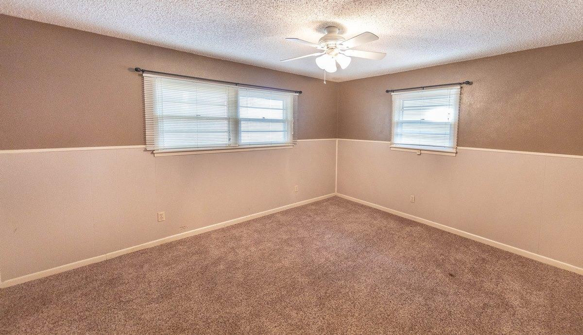 5415 8th Street Lubbock, TX 79416 - Photo 12 of 27 an empty room with a window