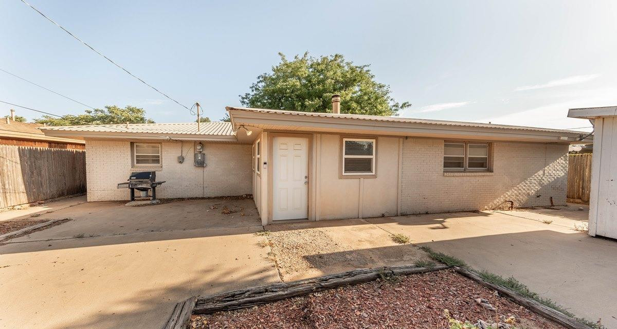 5415 8th Street Lubbock, TX 79416 - Photo 23 of 27 a view of a house with a patio