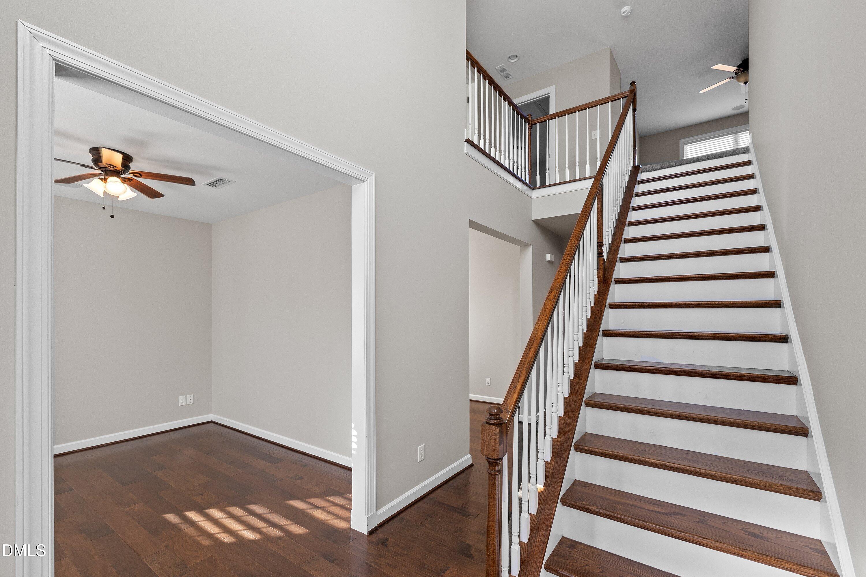 721 Maple Brook Road Fuquay-Varina, NC 27526 - Photo 6 of 59 Entry Foyer showcases open railing stairs and lots of natural light!