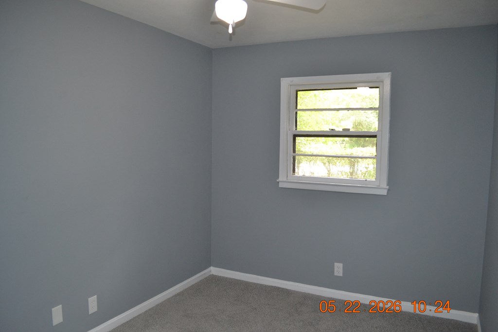 5552 Valleybrook Road Columbus, GA 31907 - Photo 10 of 27 an empty room with a window