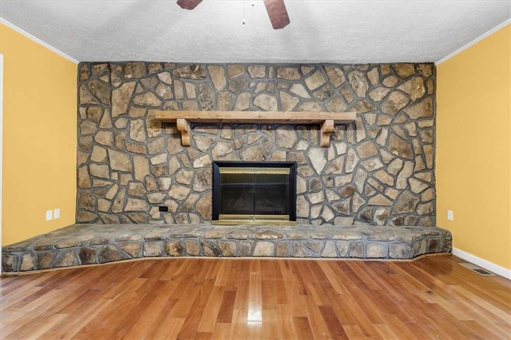 202 Ridgewood Road Cedartown, GA 30125 - Photo 19 of 39 a view of wooden floor with a fireplace