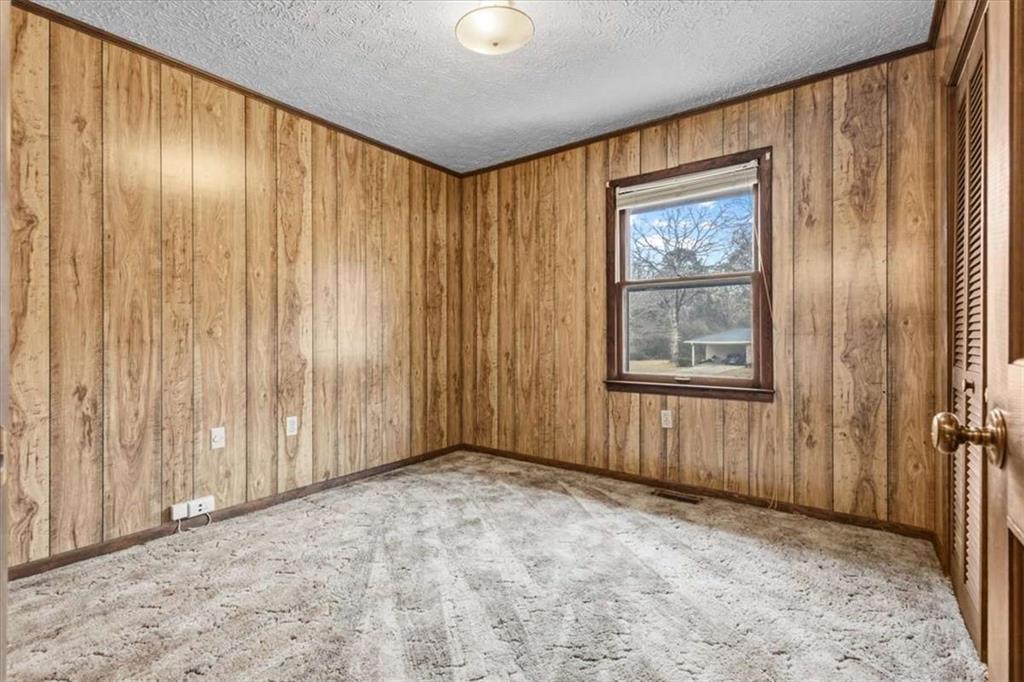 202 Ridgewood Road Cedartown, GA 30125 - Photo 21 of 39 a view of an empty room with a window
