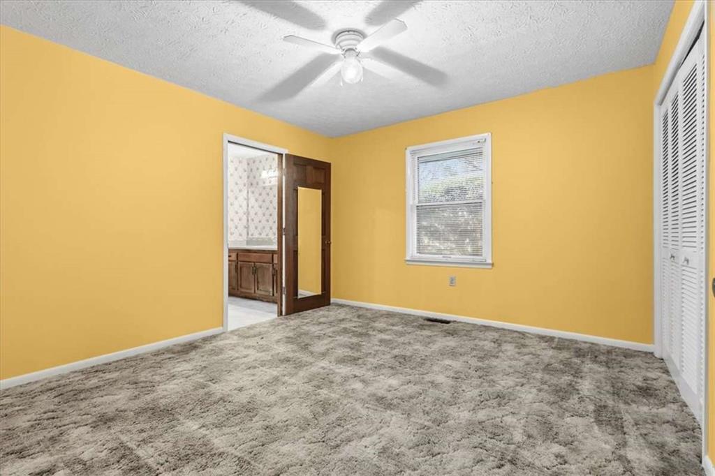 202 Ridgewood Road Cedartown, GA 30125 - Photo 25 of 39 a view of an empty room with a window