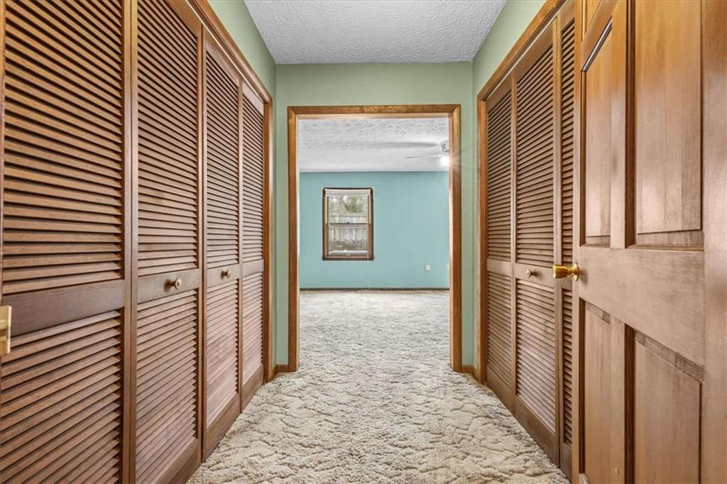 202 Ridgewood Road Cedartown, GA 30125 - Photo 29 of 39 a view of a hallway with wooden floor and staircase
