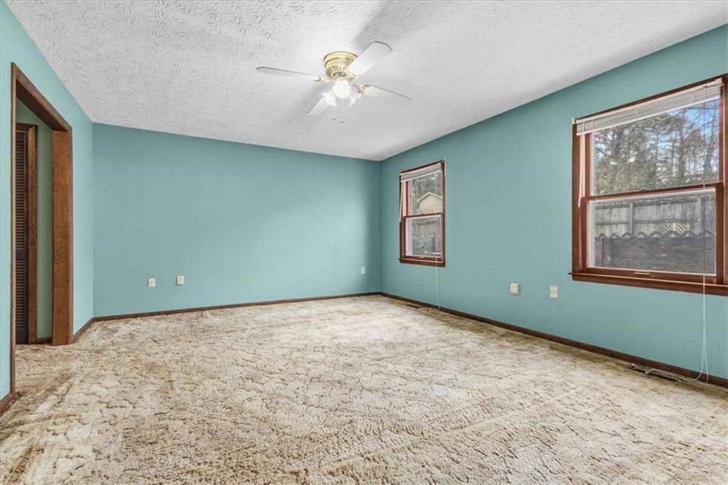 202 Ridgewood Road Cedartown, GA 30125 - Photo 31 of 39 a view of an empty room with windows