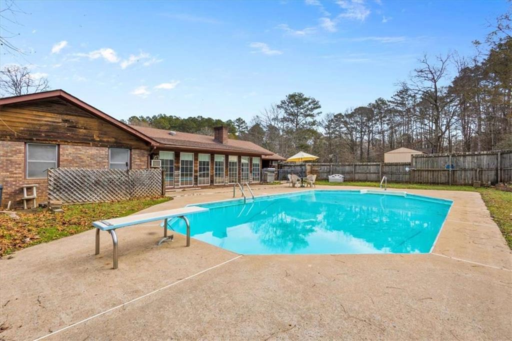 202 Ridgewood Road Cedartown, GA 30125 - Photo 5 of 39 a view of a house with a swimming pool
