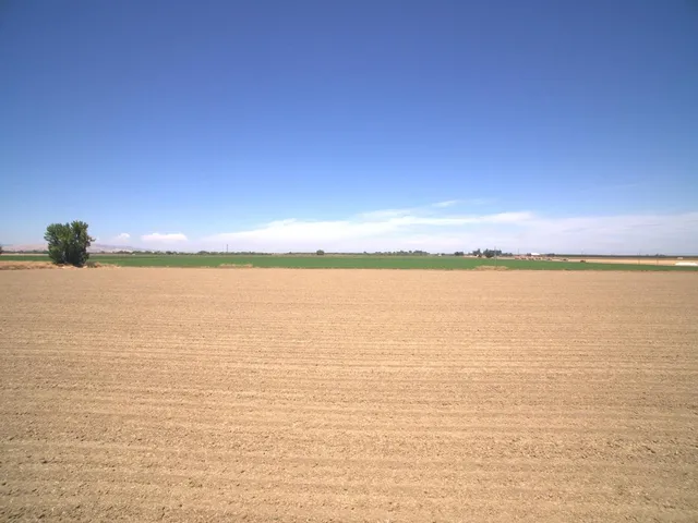 a view of balcony with wooden floor and outdoor space