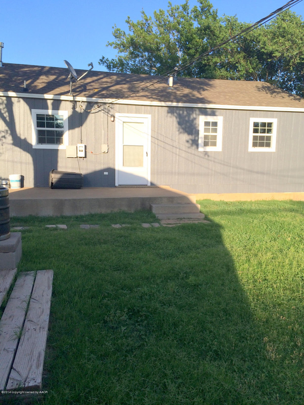 4208 South Hughes Street Amarillo, TX 79110 - Photo 11 of 16 a view of front of house with a yard