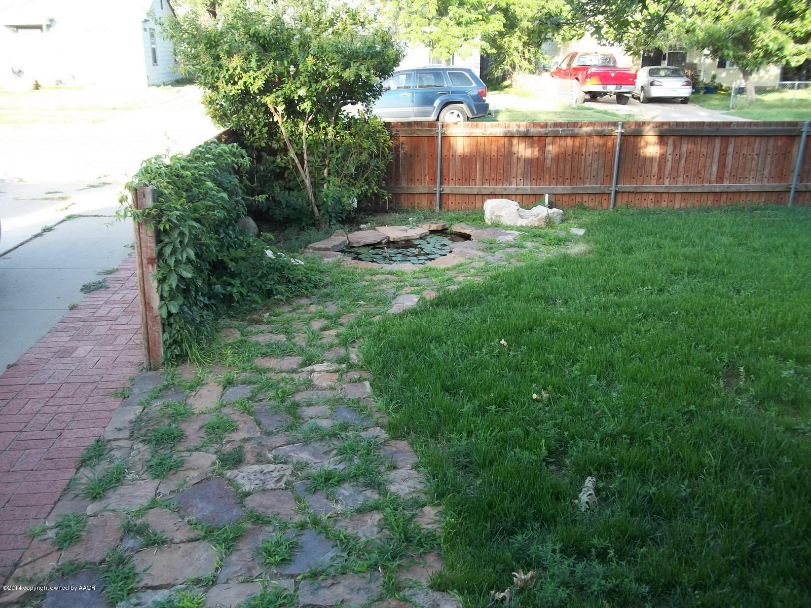 4208 South Hughes Street Amarillo, TX 79110 - Photo 2 of 16 a garden view