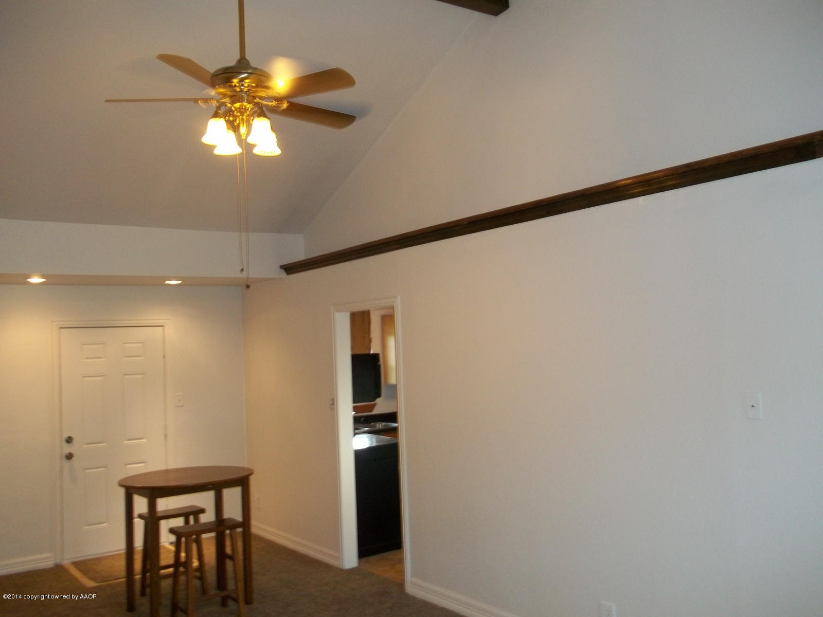 4208 South Hughes Street Amarillo, TX 79110 - Photo 3 of 16 a view of a livingroom with a chandelier fan
