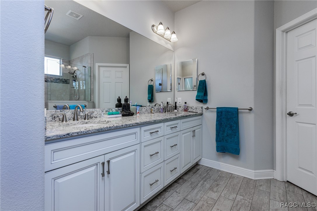 2291 North Mia Point Lecanto, FL 34461 - Photo 23 of 39 Primary Bathroom