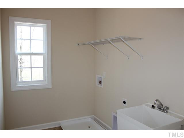 2804 Bending Tree Court Raleigh, NC 27613 - Photo 22 of 25 Tile Flooring, Drying Rack, Utility Sink, Single Window! Laundry Room