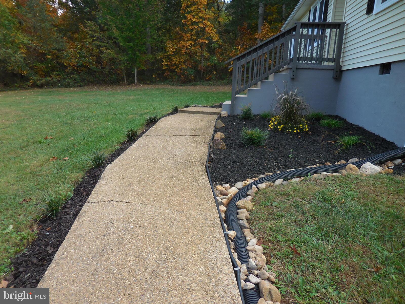 250 Outpost Road Luray, VA 22835 - Photo 5 of 25 a view of a pathway with a garden