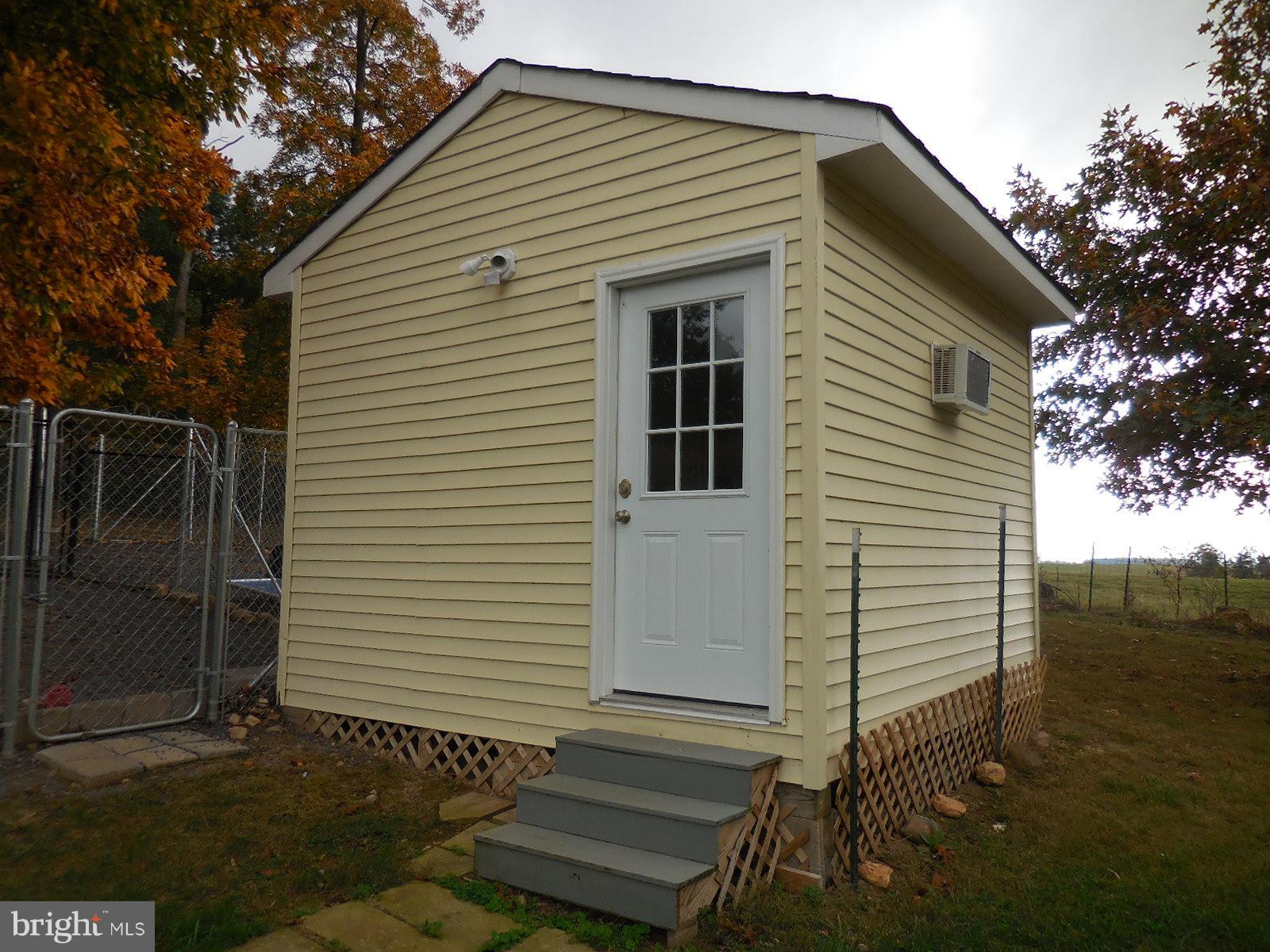 250 Outpost Road Luray, VA 22835 - Photo 9 of 25 a view of a small house with backyard