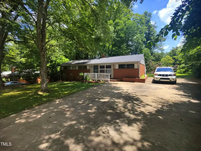 a view of house with outdoor space and street view
