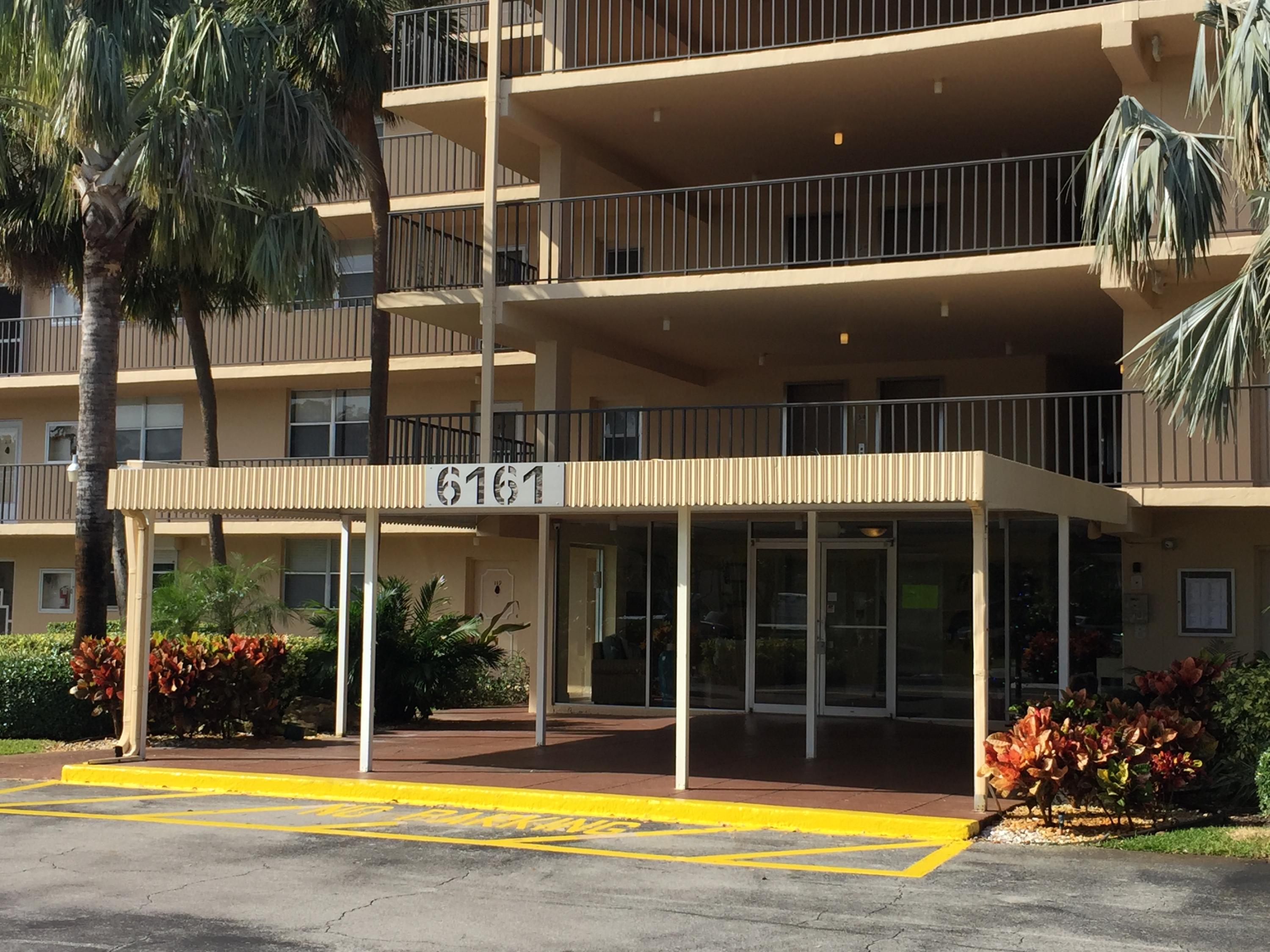 6161 Northwest 2nd Avenue, Unit 421 Boca Raton, FL 33487 - Photo 31 of 34 Building Front Entrance
