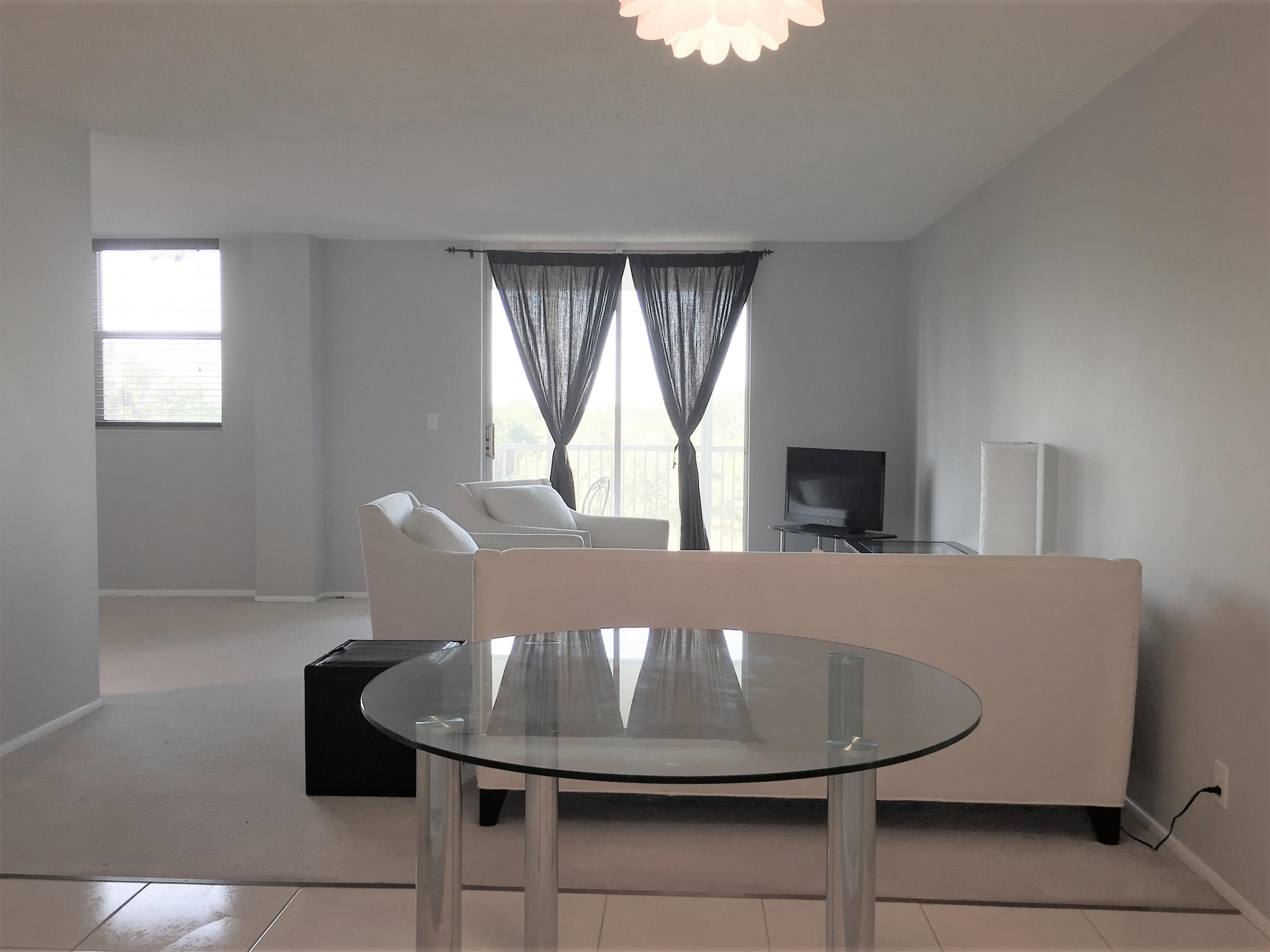 6161 Northwest 2nd Avenue, Unit 421 Boca Raton, FL 33487 - Photo 5 of 34 Dining Room & Living Room