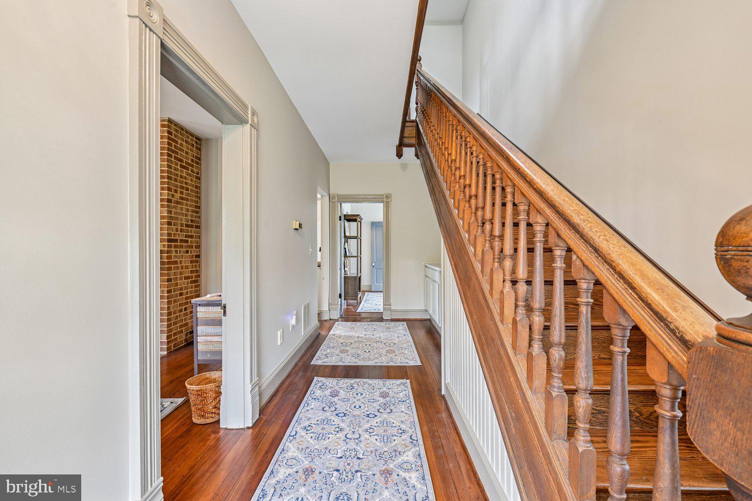 17401 Milltown Landing Road Brandywine, MD 20613 - Photo 23 of 96 Elegant hallway with classic wooden staircase.