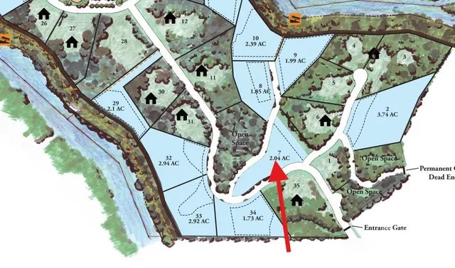 an aerial view of a house with a swimming pool