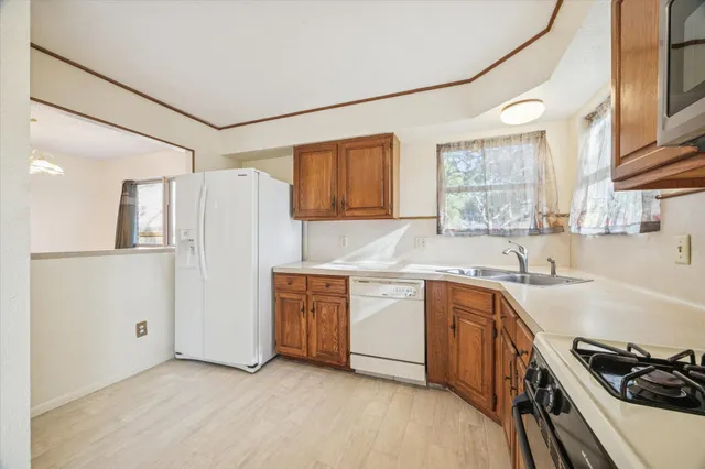 a view of empty room with windows