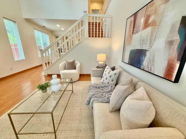 a living room with furniture and a couch