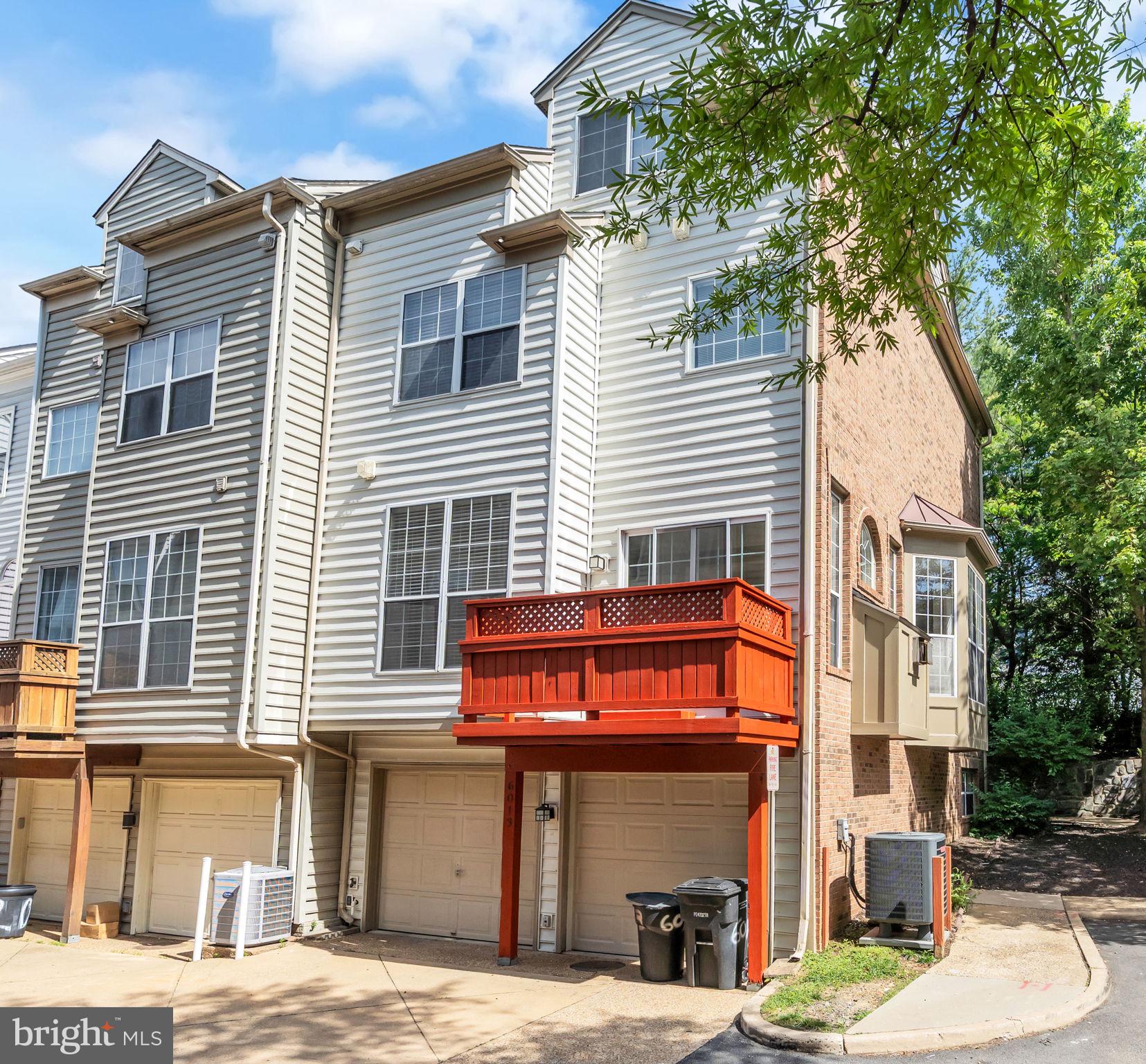 6013 Riddle Walk Alexandria, VA 22312 - Photo 31 of 31 a view of a building with a small yard