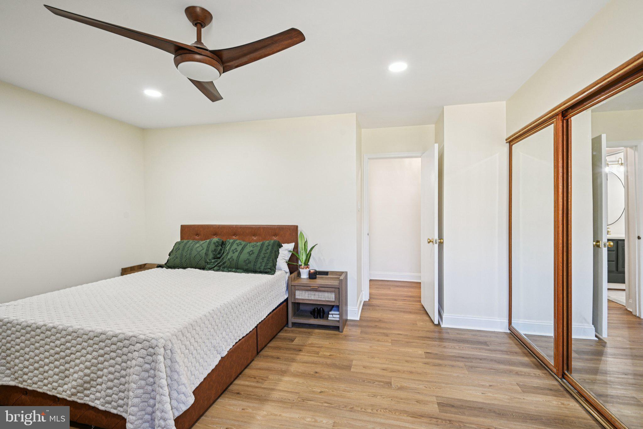 115 East Kings Highway, Unit 319 Maple Shade, NJ 08052 - Photo 18 of 37 a bedroom with a bed and a ceiling fan