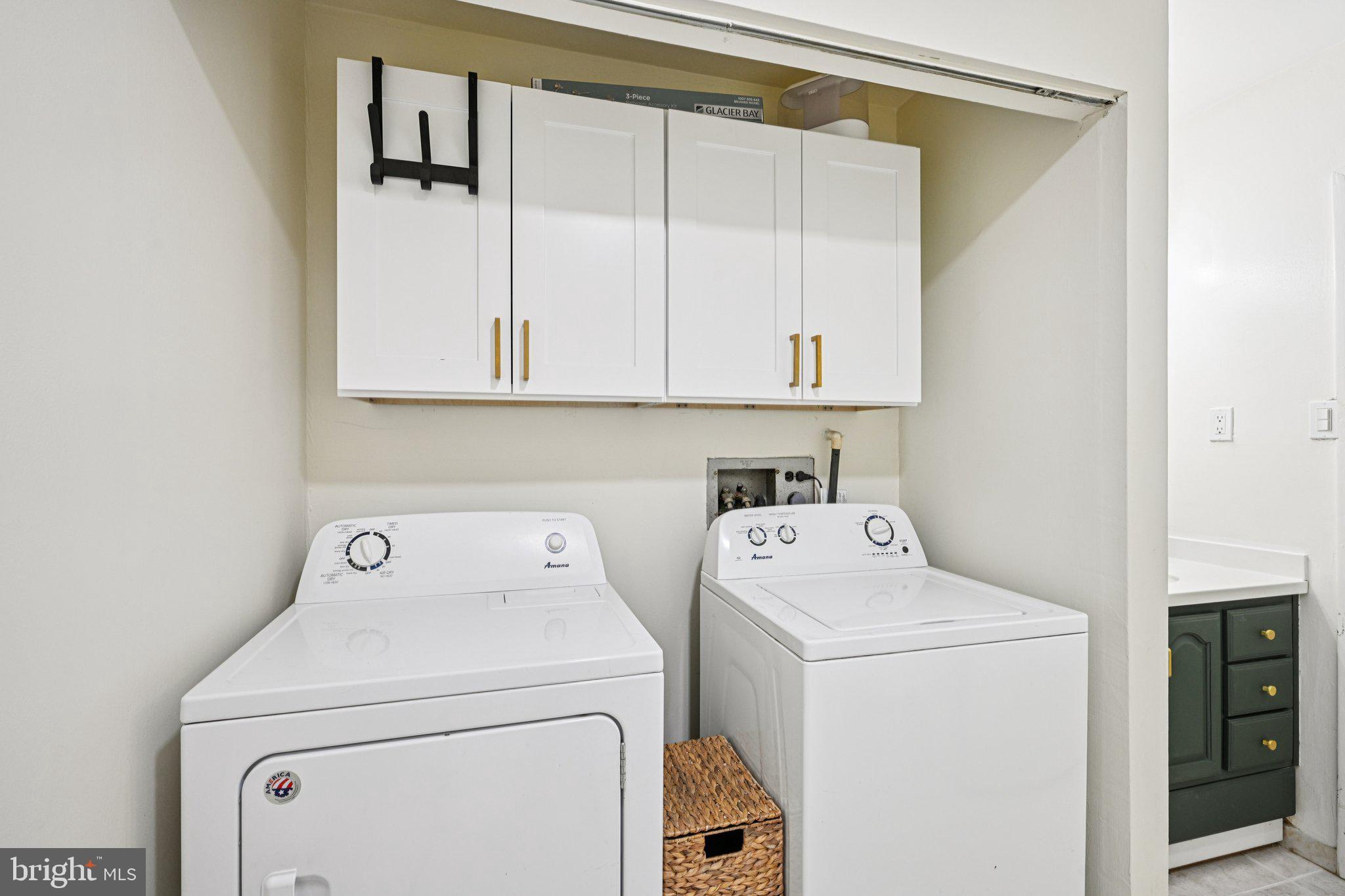 115 East Kings Highway, Unit 319 Maple Shade, NJ 08052 - Photo 21 of 37 a utility room with dryer and washer