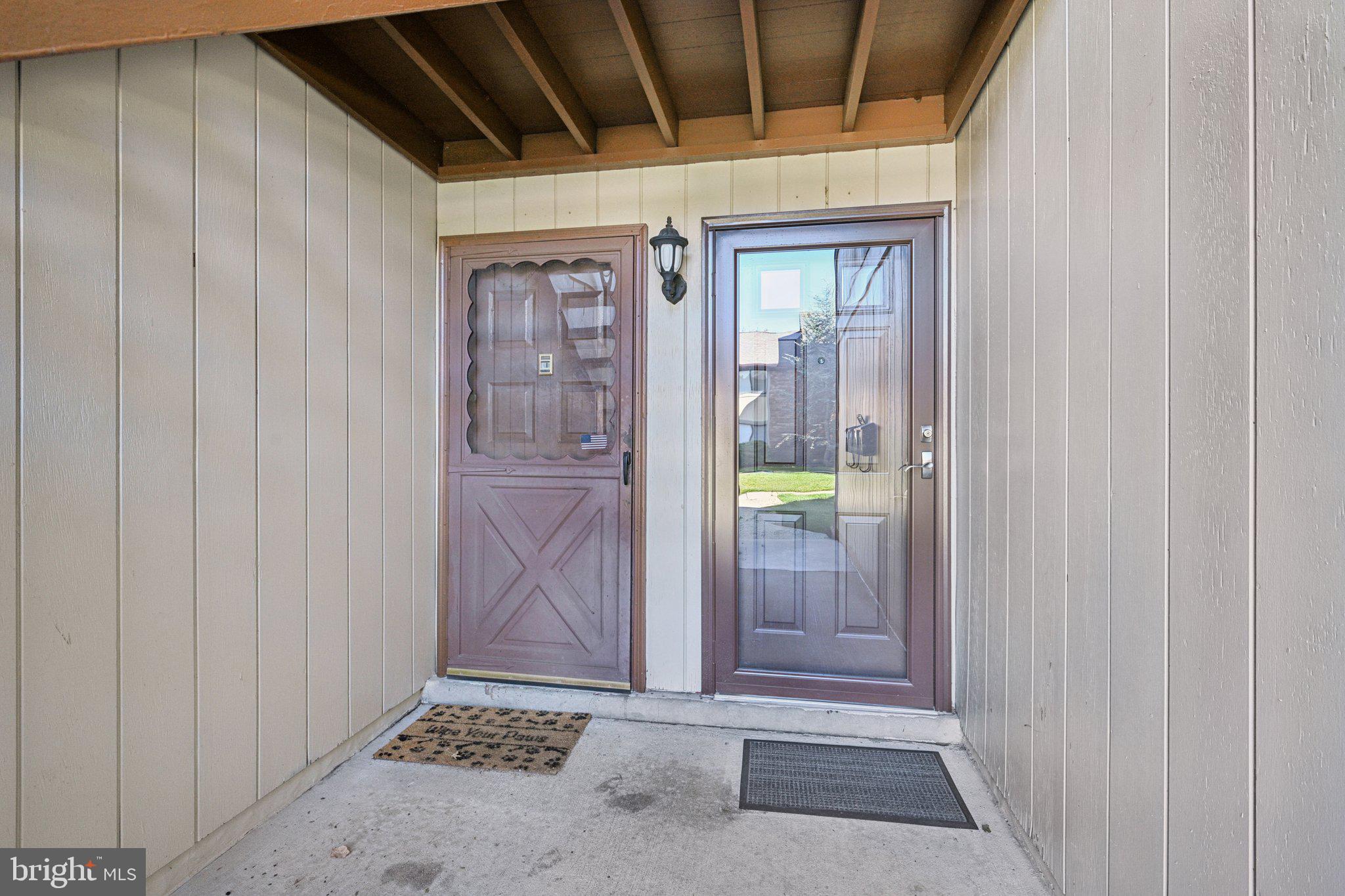 115 East Kings Highway, Unit 319 Maple Shade, NJ 08052 - Photo 3 of 37 a view of front door