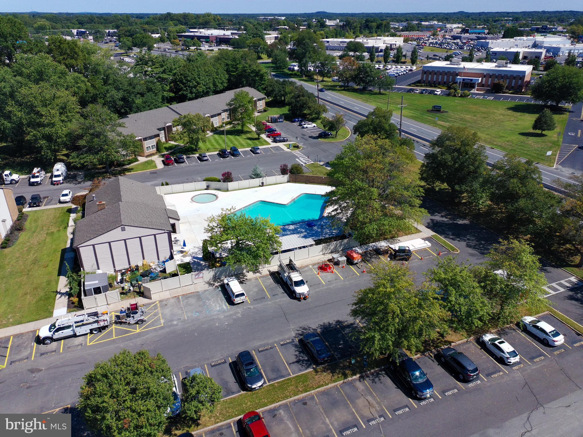 115 East Kings Highway, Unit 319 Maple Shade, NJ 08052 - Photo 31 of 37 an aerial view of a house with yard swimming pool and outdoor seating