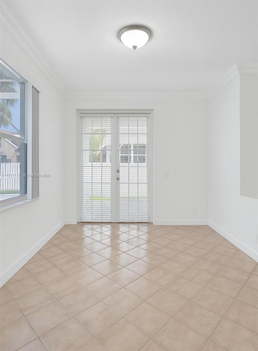 797 Chimney Rock Road, Unit 797 Weston, FL 33327 - Photo 20 of 26 a view of an empty room with a window