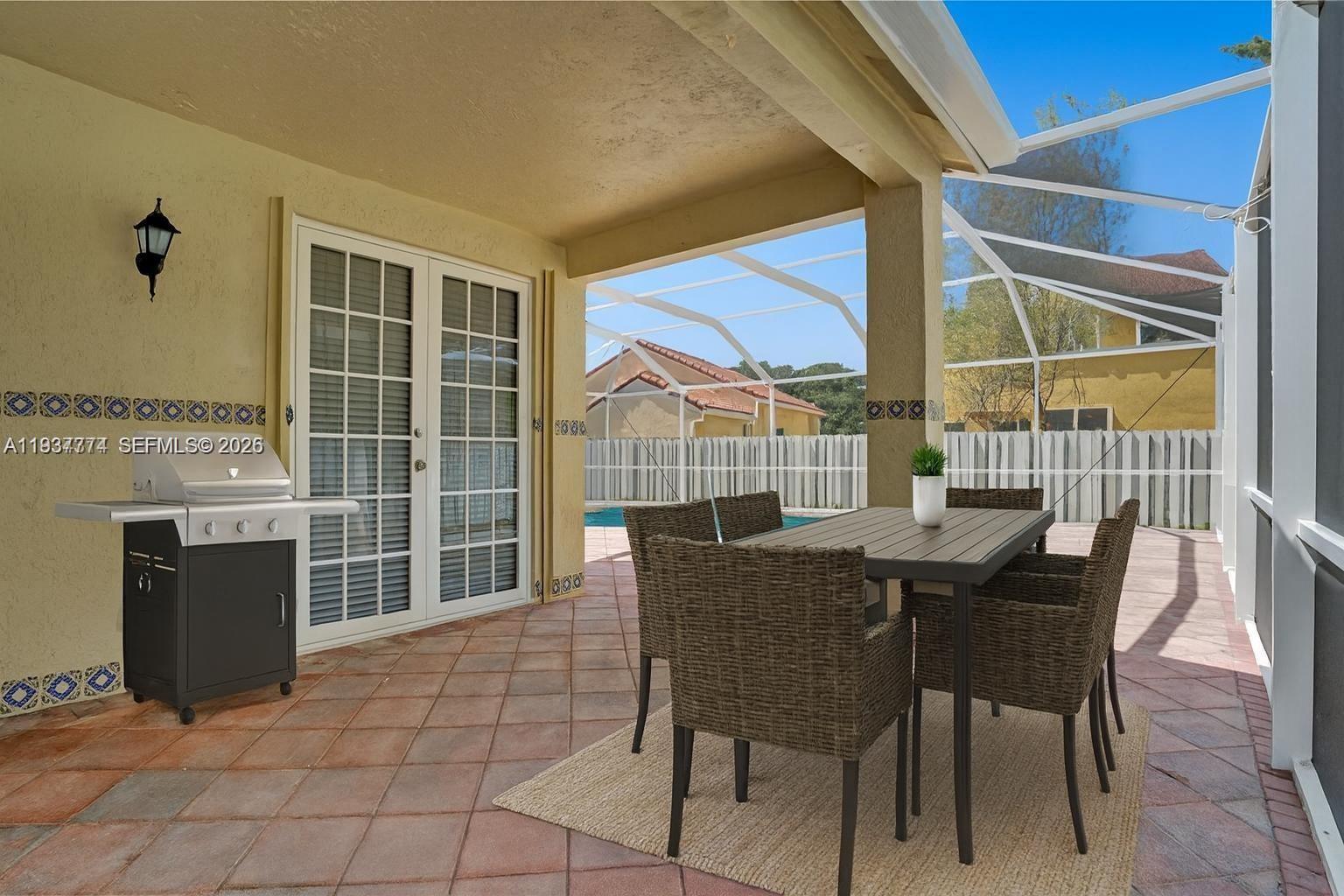 797 Chimney Rock Road, Unit 797 Weston, FL 33327 - Photo 4 of 26 a view of a dining room with furniture window and outside view