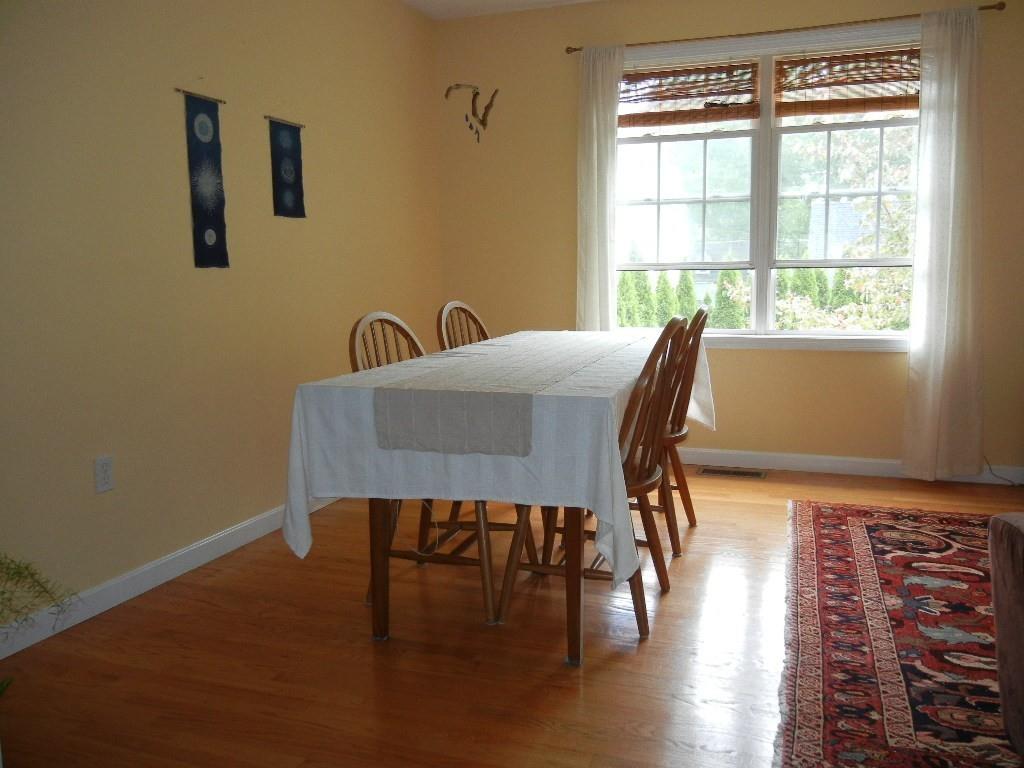 113 Appleton Street Springfield, MA 01108 - Photo 20 of 40 a workspace room with furniture and wooden floor
