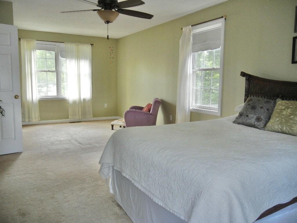 113 Appleton Street Springfield, MA 01108 - Photo 27 of 40 a bedroom with a bed and window