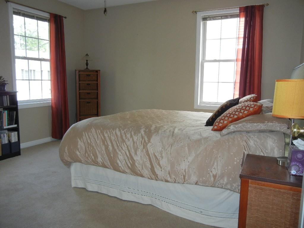 113 Appleton Street Springfield, MA 01108 - Photo 28 of 40 a bedroom with a bed and a window