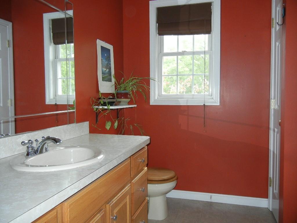 113 Appleton Street Springfield, MA 01108 - Photo 31 of 40 a bathroom with a sink a toilet and window