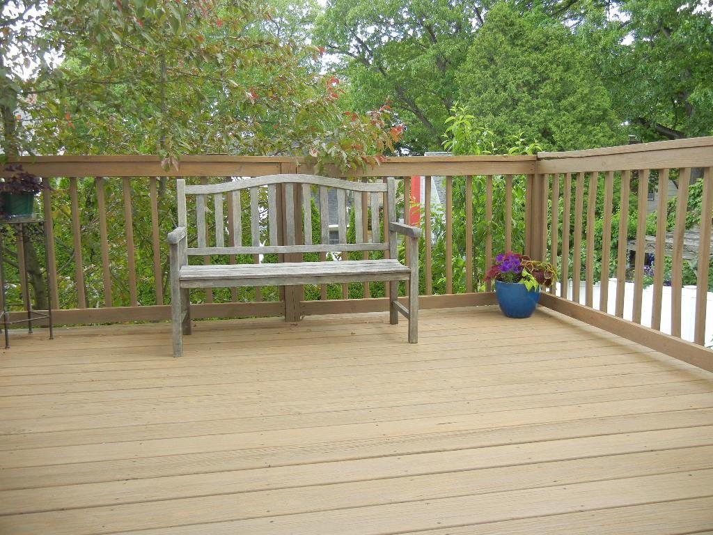 113 Appleton Street Springfield, MA 01108 - Photo 8 of 40 a view of balcony with wooden floor and bench