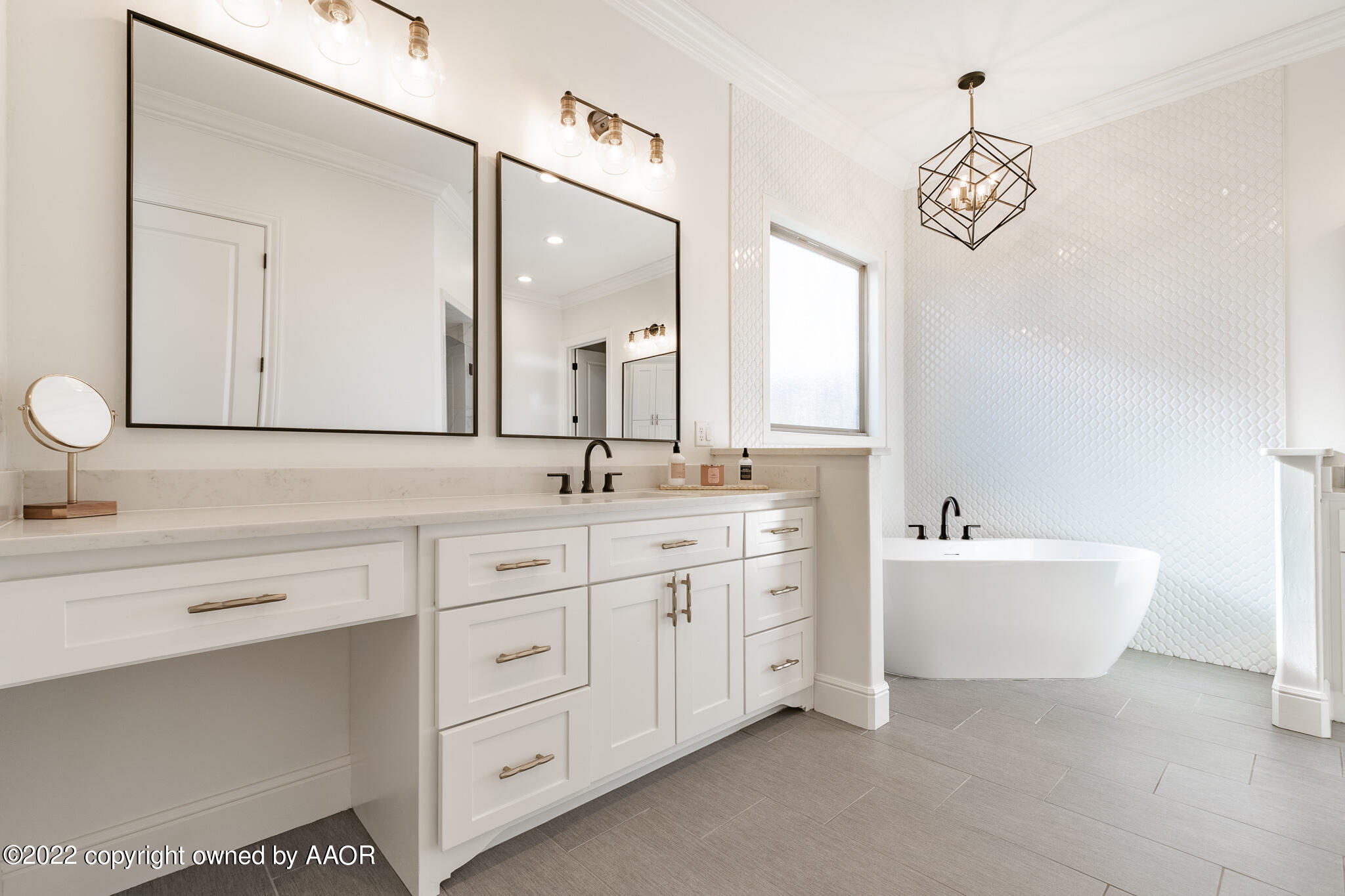 8406 Georgetown Drive Amarillo, TX 79119 - Photo 20 of 43 a bathroom with a sink double vanity and a mirror