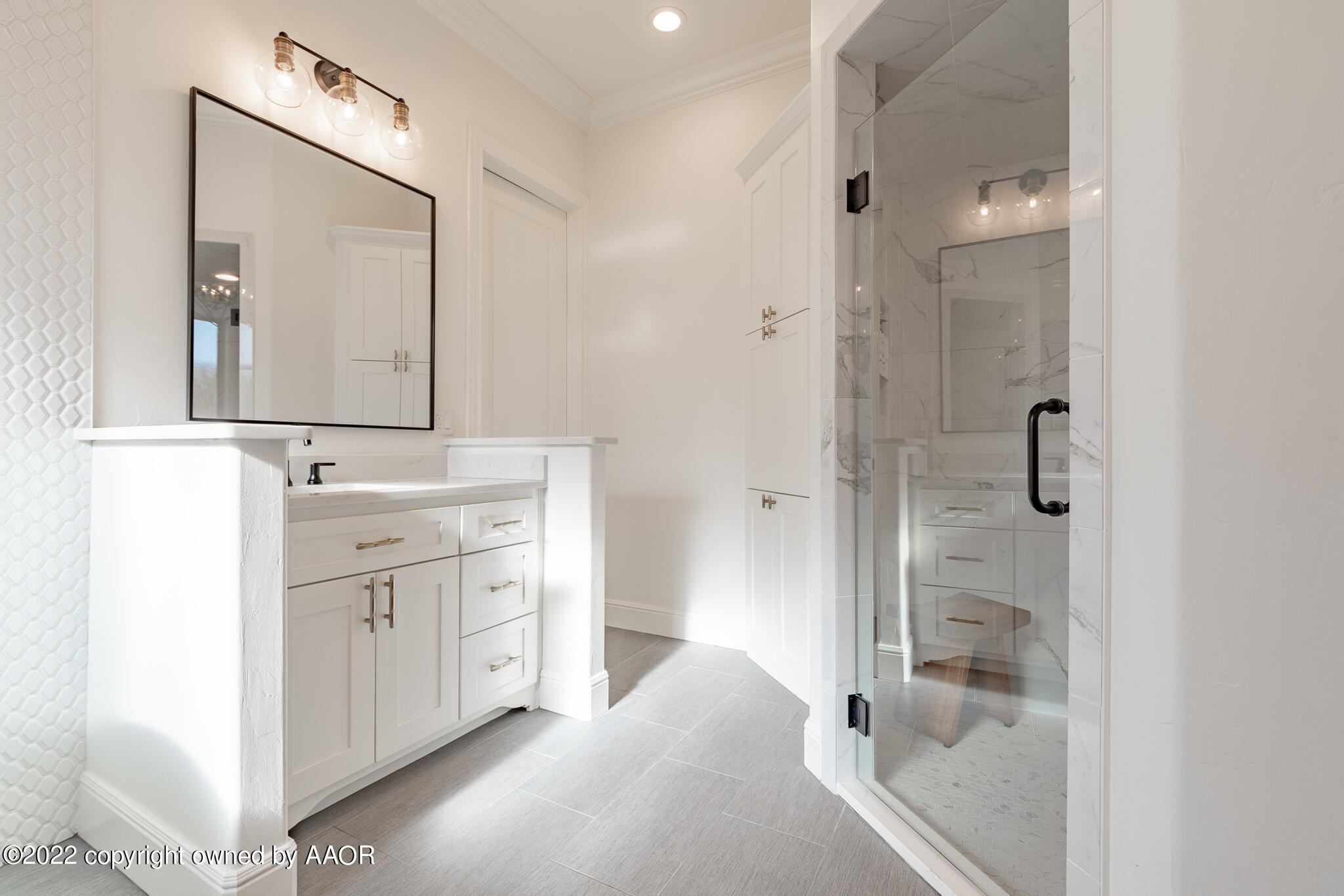 8406 Georgetown Drive Amarillo, TX 79119 - Photo 24 of 43 a bathroom with a double vanity sink mirror and shower