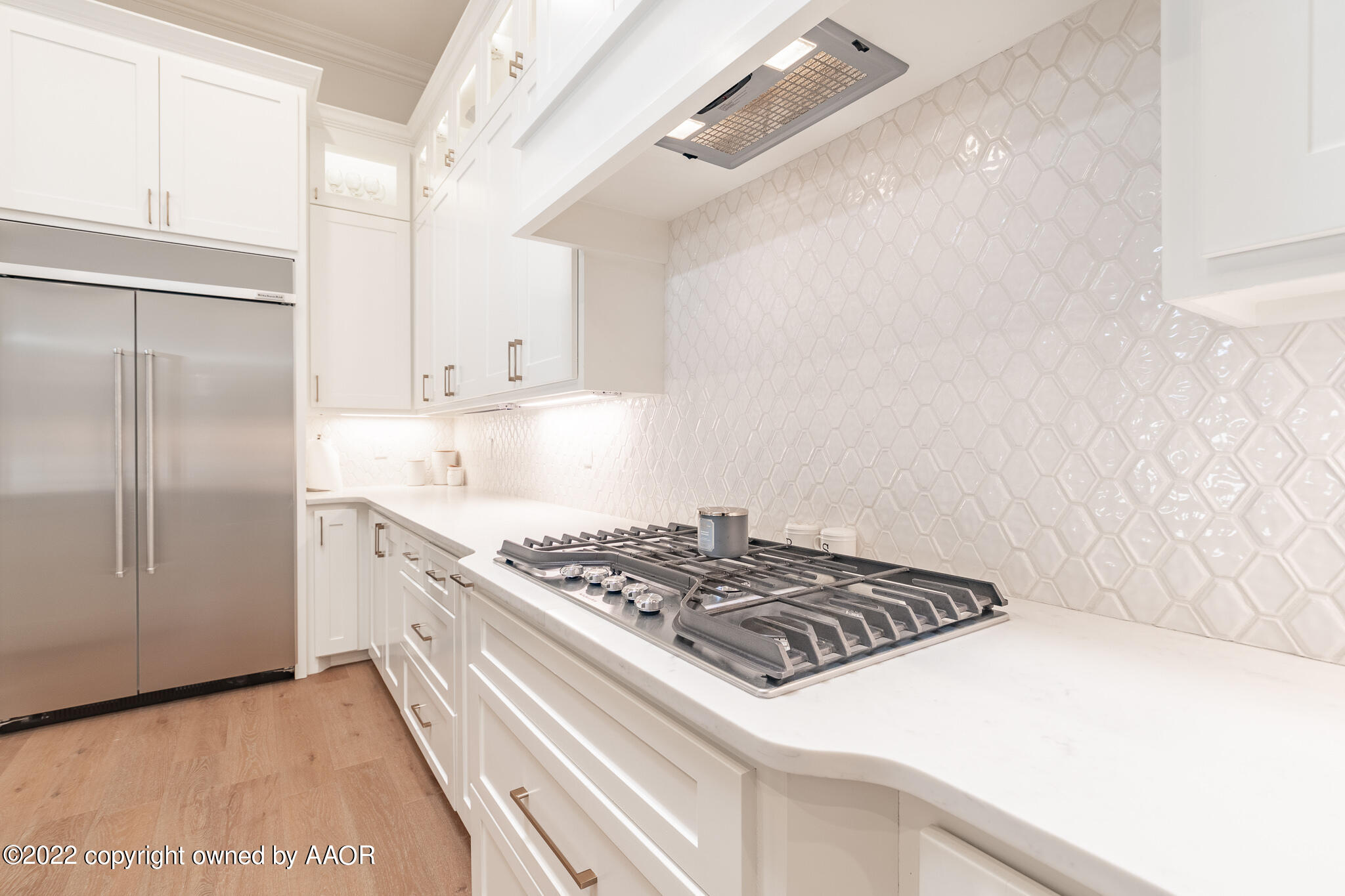 8406 Georgetown Drive Amarillo, TX 79119 - Photo 10 of 43 a kitchen with a stove and a refrigerator