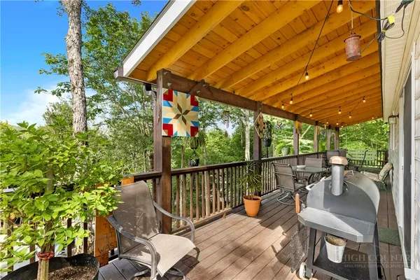 a view of a two chairs in the deck