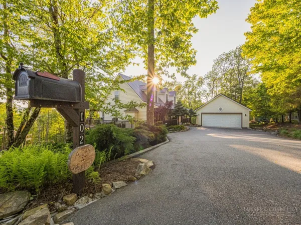 a house view with a garden space