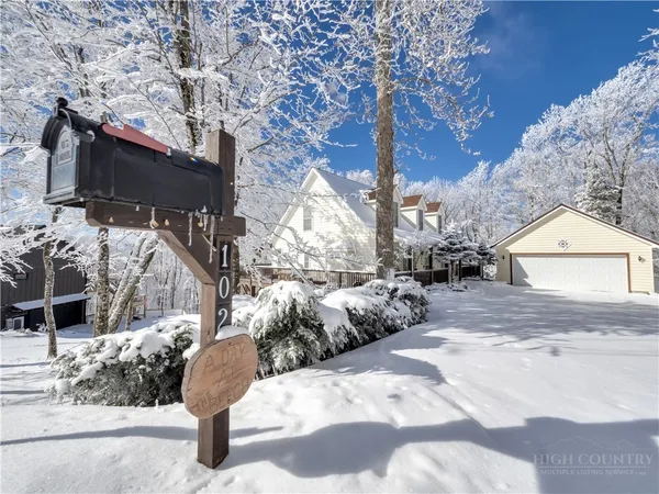 a view of a backyard of the house